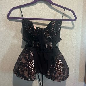 Beautiful Victoria’s Secret I would say some more 34B corset, one piece